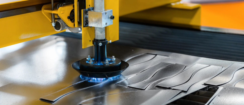 Close-up of a laser cutting machine shaping metal sheets.