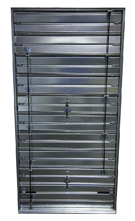 Silver metal garage door with horizontal ridges and a central handle.